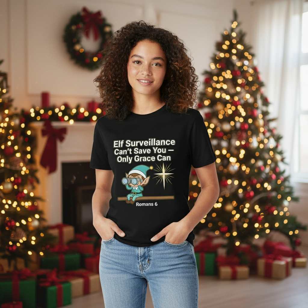 Christian Christmas Tee - "Elf Surveillance Can't Save You — Only Grace Can" (Romans 6)